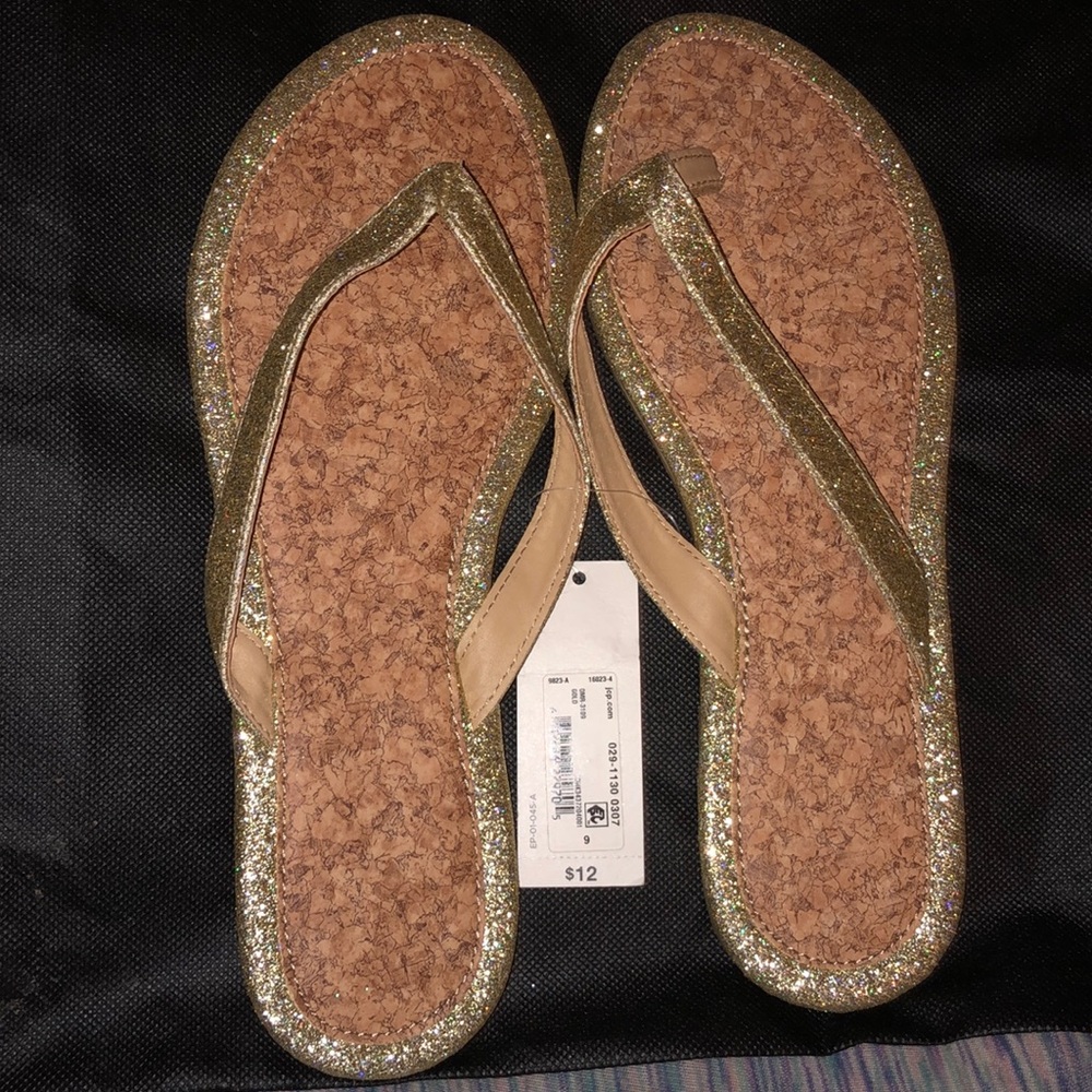 Cork sole, gold glitter strap flip flops.